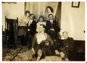 Members of the Love family with bear skin rug, [191-] thumbnail