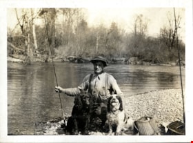 Henry Love fishing with dogs, [191-] thumbnail