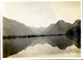 Water with mountainous shoreline, [191-] thumbnail