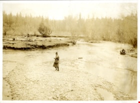 Man walking on shore of Pitt Lake, [191-] thumbnail