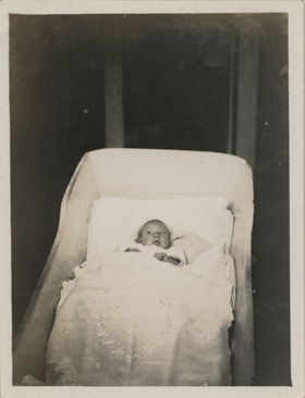 Baby in bassinet, [192-] thumbnail