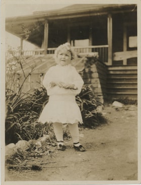 Mary Stanley in front of the Whiting house, [between 1922 and 1927] thumbnail