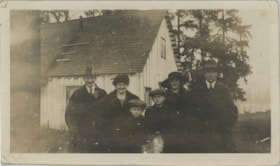 Six people outside in front of building, [1920] thumbnail