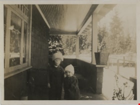 Two children on porch, [192-] thumbnail