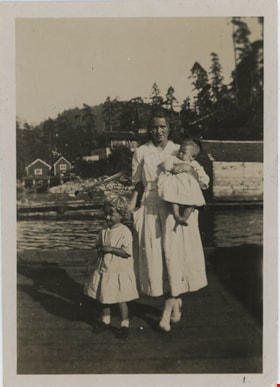 Woman with two children, [193-] thumbnail