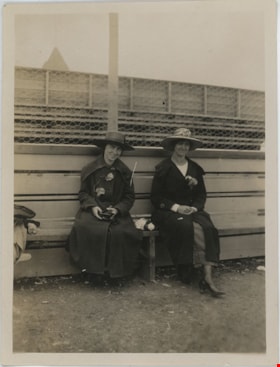 Two women seated on bench, [191-] thumbnail
