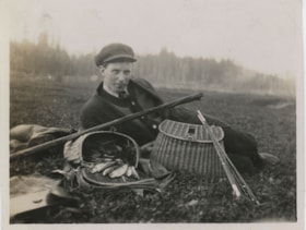 Man with fish and fish baskets, [191-] thumbnail