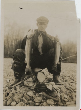 Bob Love holding fish, [191-] thumbnail