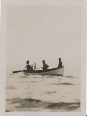 Three people in row boat, [191-] thumbnail