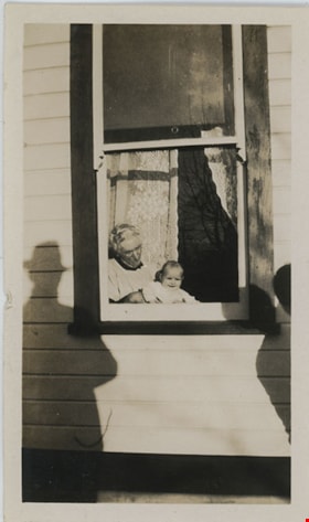 Grandmother with child in window, [1930] thumbnail