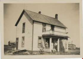 Group on porch of farmhouse, [193-] thumbnail