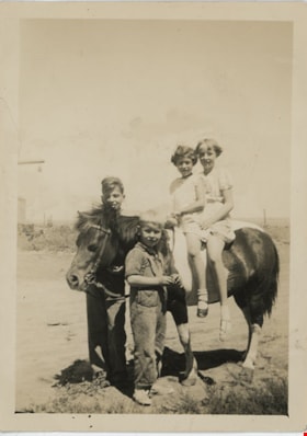Frank, Don, Joyce and Myrna with pony, [192-] thumbnail
