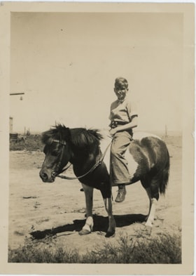 Frank Stanley riding pony, [193-] thumbnail