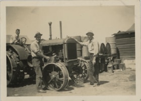 Three men with tractor, [193-] thumbnail