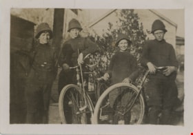 Four boys with two bicycles, [191-] thumbnail