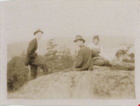 Esther Love Stanley with two men on rock, [192-] thumbnail