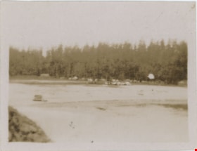 Looking towards shoreline with cabins, [191-] thumbnail