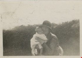 Betty Conquest holding baby Mary Stanley, [192-] thumbnail