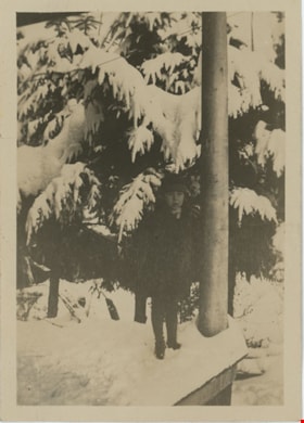 Joyce Stanley standing in snow, [192-] thumbnail