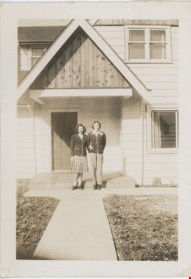 Joyce Stanley and woman in front of house, [194-] thumbnail