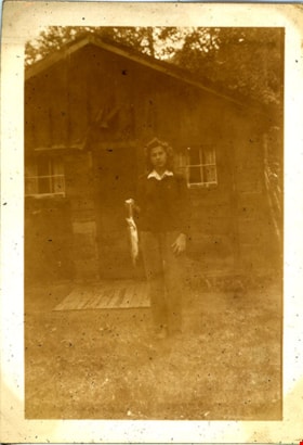 Joyce Stanley holding fish, [194-] thumbnail