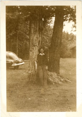 Joyce Stanley leaning against tree, [194-] thumbnail