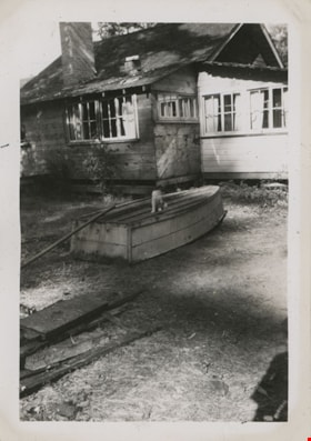 Cat on boat at Boundary Bay cabin, [194-] thumbnail