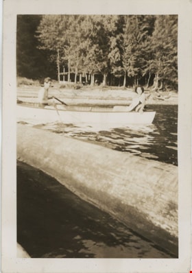 Man and woman in row boat, [194-] thumbnail