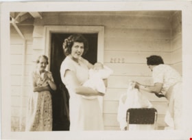 Ina holding infant daughter, [194-] thumbnail