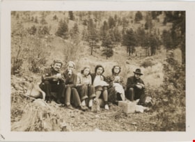 Stanley family picnicing on hillside, [194-] thumbnail