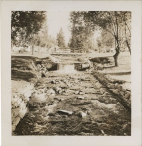 Bridge over rushing creek, [194-] thumbnail