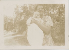 Esther Stanley holding grandchild, [194-] thumbnail