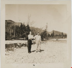 Ramsay and Stan on rocky shore, [194-] thumbnail
