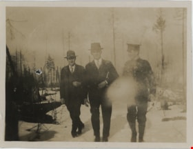 Three men walking down road, [between 1914 and 1918] thumbnail