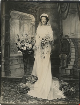 Bride with flowers, [193-] thumbnail