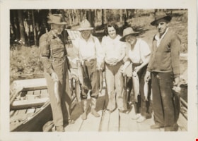 Group on dock with fish at Watch Lake, [193-] thumbnail