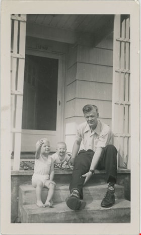 Robert Leonard Love with sons on porch, [1951 or 1952] thumbnail