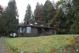 Exterior view of the Alfred & Ruth Macleod Cottage, 2013. (Oblique view from the north. Exterior Photo). Copyright: City of Burnaby. thumbnail