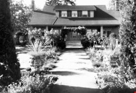 Exterior view of the front elevation of the E.W. Bateman House, c.1920 (North elevation. Historic Photo). Copyright: Burnaby Village Museum Collection, BV. 977.90.7. thumbnail